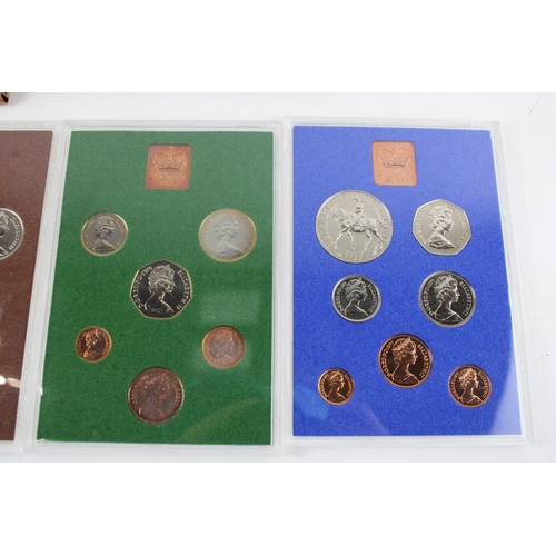 2207A - Four The Coinage of Great Britain and Northern Ireland proof coin sets, 1974, 1975, 1976 and 1977