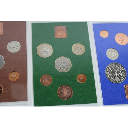 2207A - Four The Coinage of Great Britain and Northern Ireland proof coin sets, 1974, 1975, 1976 and 1977