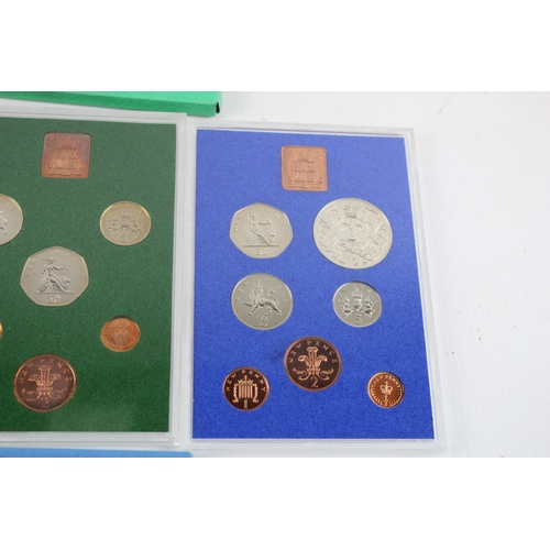 2207A - Four The Coinage of Great Britain and Northern Ireland proof coin sets, 1974, 1975, 1976 and 1977