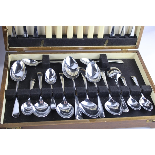 633 - Two cased cutlery sets