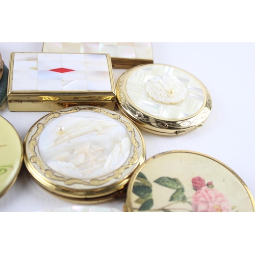 635 - Twelve vintage powder compacts