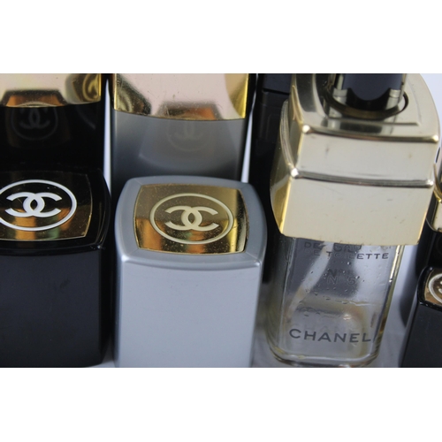 637 - Six empty Chanel perfume bottles