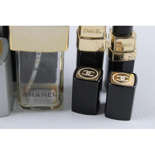 637 - Six empty Chanel perfume bottles