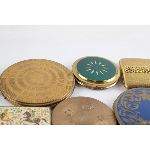 638 - Twelve vintage powder compacts