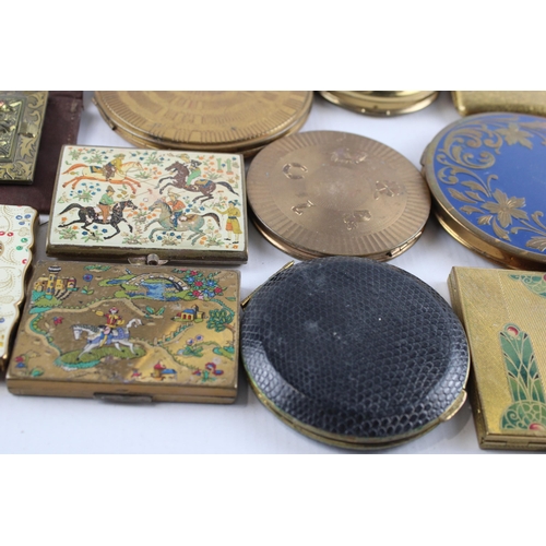 638 - Twelve vintage powder compacts