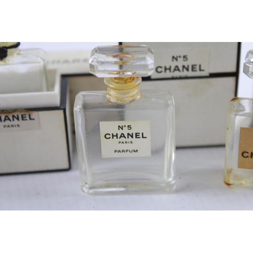 640 - Five empty Chanel perfume bottles