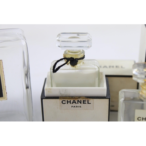 640 - Five empty Chanel perfume bottles