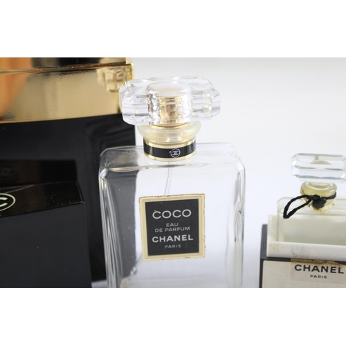 640 - Five empty Chanel perfume bottles