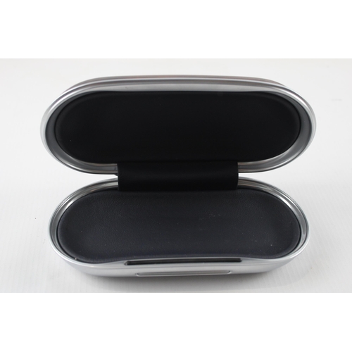 641 - A Bentley walnut glasses case with black leather interior