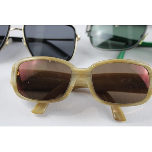 645 - Five pairs of sunglasses to include Ralph Lauren, Dolce & Gabbana etc.