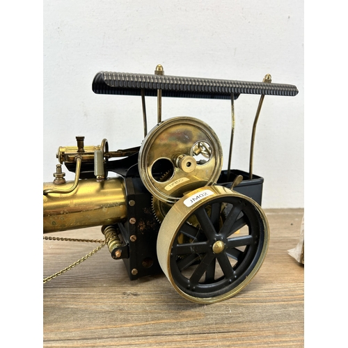 398 - A Wilesco Old Smoky live steam roller with assembly instructions and further accessories - approx. 2... 