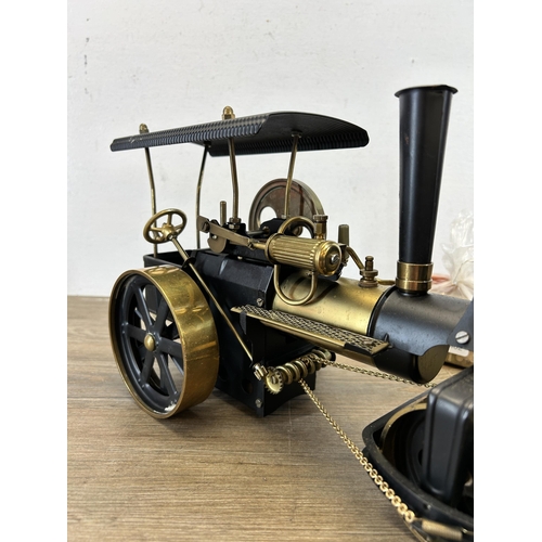 398 - A Wilesco Old Smoky live steam roller with assembly instructions and further accessories - approx. 2... 