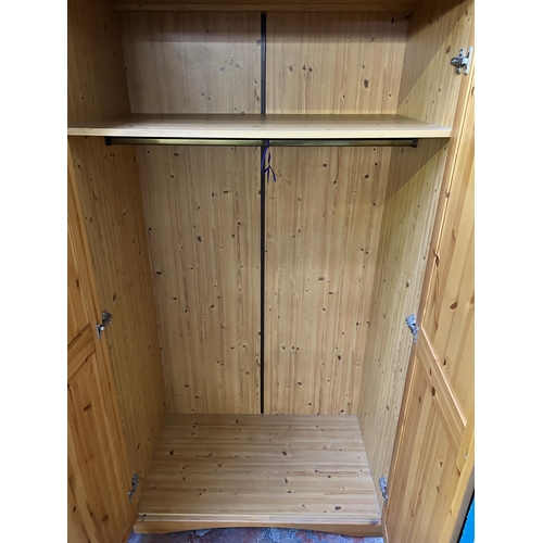 1 - A pine double wardrobe - approx. 184cm high x 96cm wide x 53cm deep