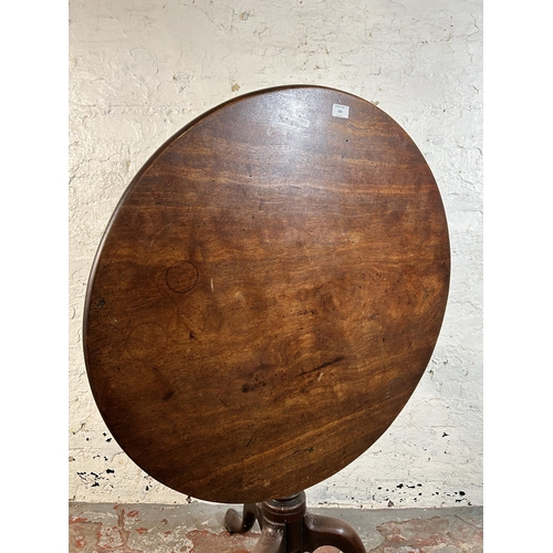 106 - A George III mahogany circular tilt top tripod occasional table - approx. 115cm high when tilted x 8... 