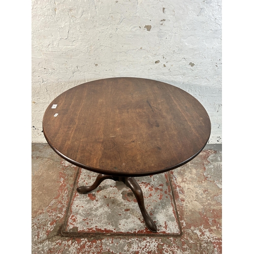 106 - A George III mahogany circular tilt top tripod occasional table - approx. 115cm high when tilted x 8... 