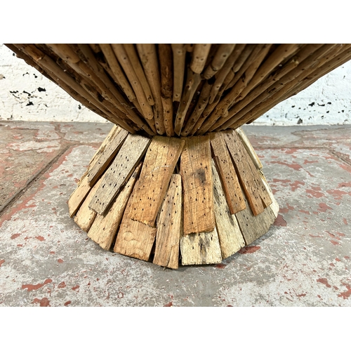 107 - A contemporary driftwood and glass top circular coffee table - approx. 42cm high x 75cm in diameter