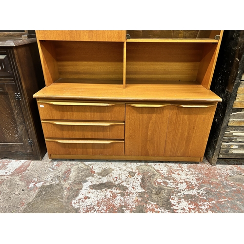 12 - A mid 20th century Sakol Furniture teak display cabinet - approx. 170cm high x 120cm wide x 30cm dee... 