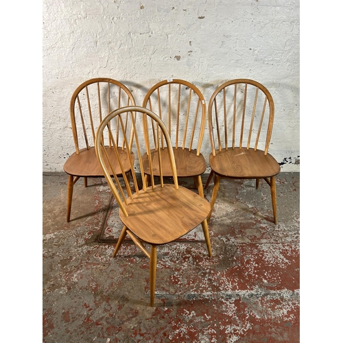 123 - Four Ercol blonde elm and beech Windsor dining chairs