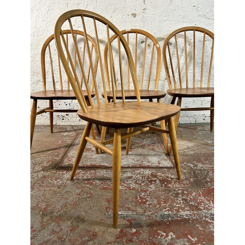 123 - Four Ercol blonde elm and beech Windsor dining chairs