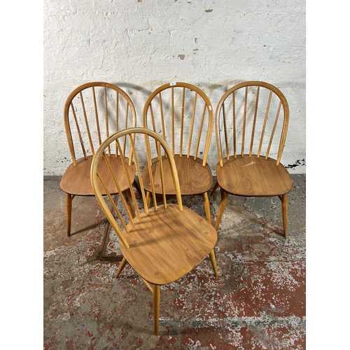 123 - Four Ercol blonde elm and beech Windsor dining chairs