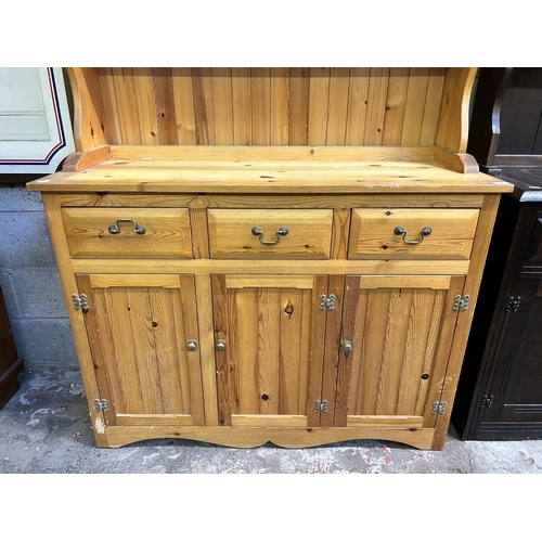 14 - A pine dresser - approx. 197cm high x 122cm wide x 46cm deep