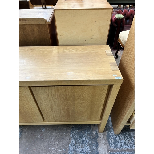 149 - A Scandinavian Karel Mintjens oak four door sideboard - approx. 91cm high x 243cm wide x 45cm deep