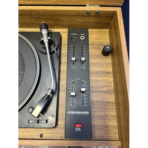 17 - A mid 20th century teak effect cabinet containing Ambassador record player - approx. 82cm high x 61c... 