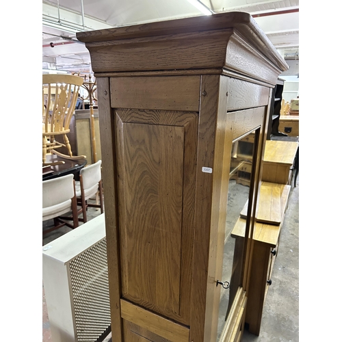 37 - A modern solid oak display cabinet - approx. 171cm high x 98cm wide x 41cm deep