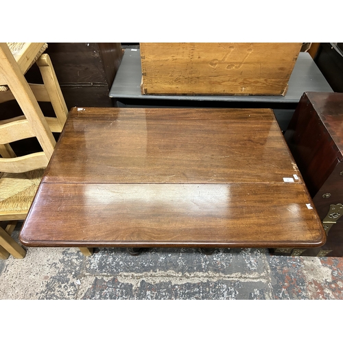 45 - A William IV mahogany drop leaf pedestal tea table - approx. 73cm high x 101cm wide x 106cm deep