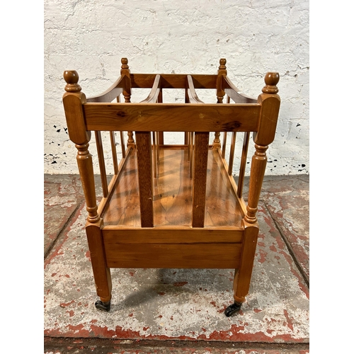 48 - A Regency style yew wood three division Canterbury magazine rack - approx. 53cm high x 50cm wide x 3... 