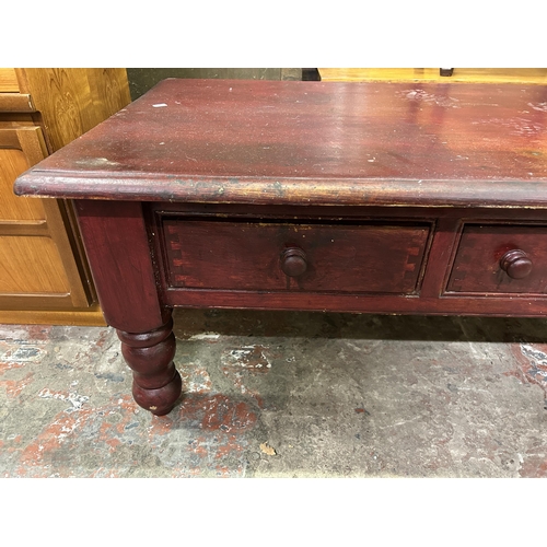 60 - A modern stained pine three drawer coffee table