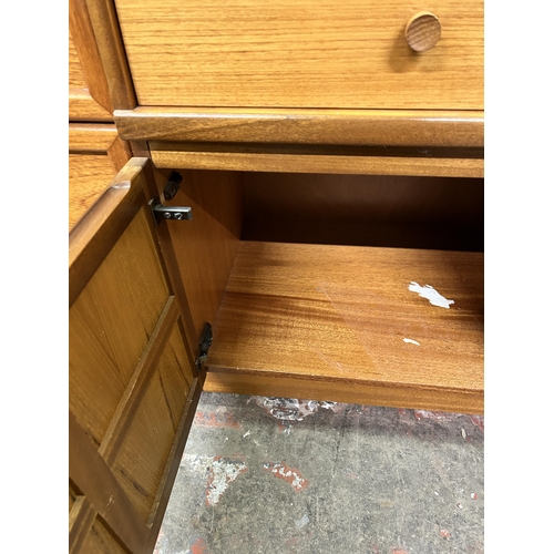 62 - A Nathan teak sideboard - approx. 75cm high x 102cm wide x 45cm deep