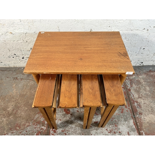 64 - A Poul Hundevad style teak nest of tables