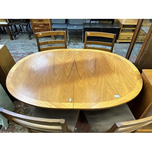 69 - A Nathan teak extending dining table and four chairs - approx. 74cm high x 91cm wide x 135cm long