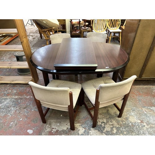 78 - A mahogany extending dining table and four chairs