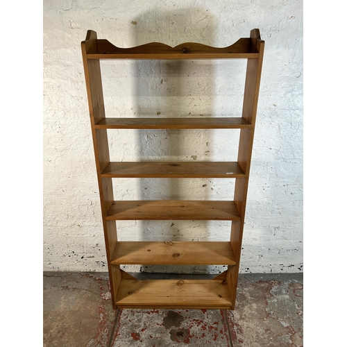 80 - A solid pine six tier bookshelf - approx. 174cm high x 84cm wide x 21cm deep