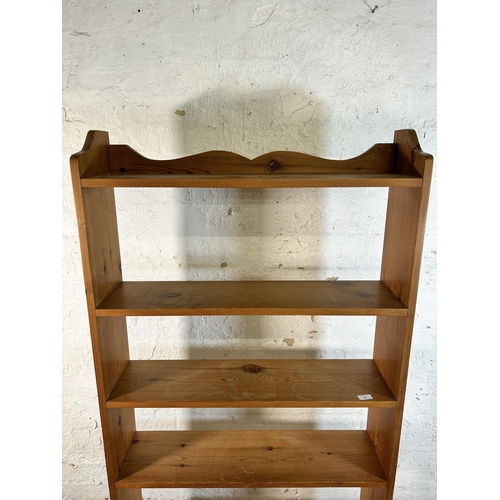 80 - A solid pine six tier bookshelf - approx. 174cm high x 84cm wide x 21cm deep