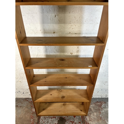 80 - A solid pine six tier bookshelf - approx. 174cm high x 84cm wide x 21cm deep