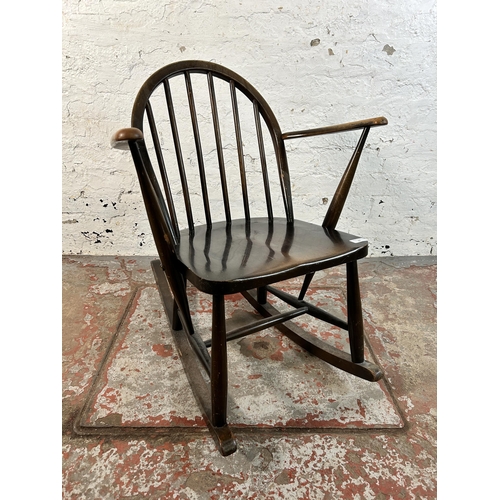 90 - A mid 20th century Ercol beech Windsor rocking chair