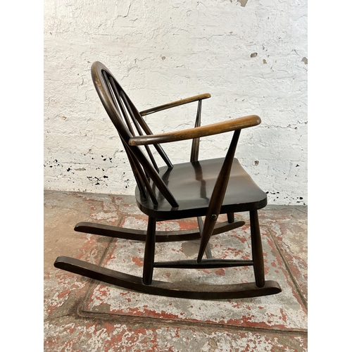 90 - A mid 20th century Ercol beech Windsor rocking chair