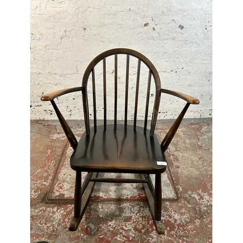 90 - A mid 20th century Ercol beech Windsor rocking chair