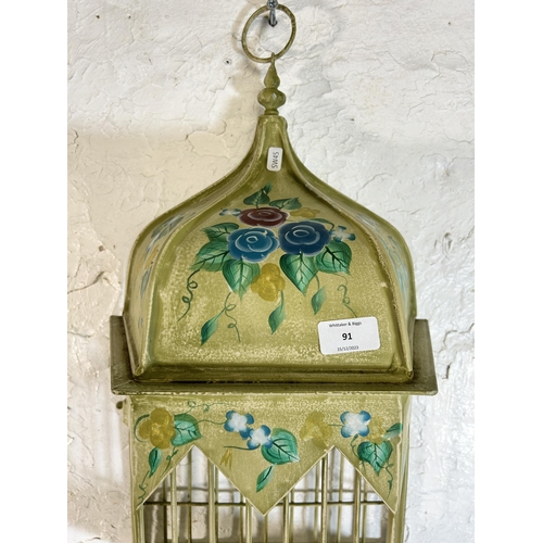 91 - A modern hand painted metal hanging ornamental bird cage - approx. 52cm high