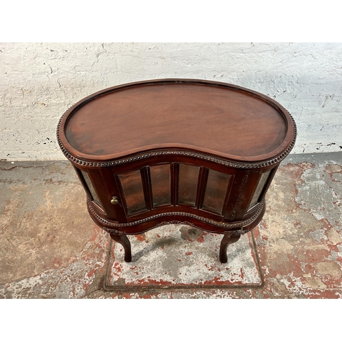 93 - A Regency style mahogany kidney shaped drinks cabinet with removable tray - approx. 78cm high x 76cm... 