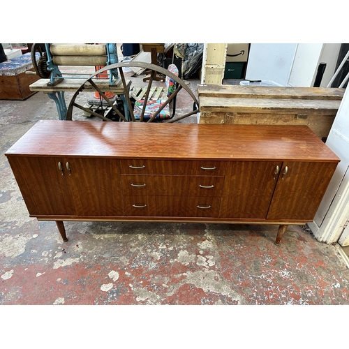 97 - A mid 20th century tola wood sideboard - approx. 74cm high x 183cm wide x 46cm deep