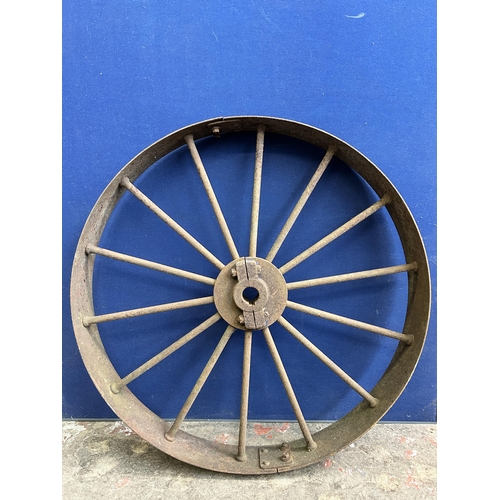 98 - An antique cast iron industrial wheel - approx. 106cm in diameter