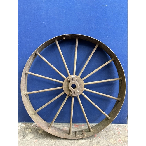 98 - An antique cast iron industrial wheel - approx. 106cm in diameter