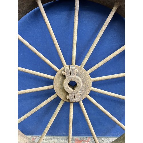 98 - An antique cast iron industrial wheel - approx. 106cm in diameter