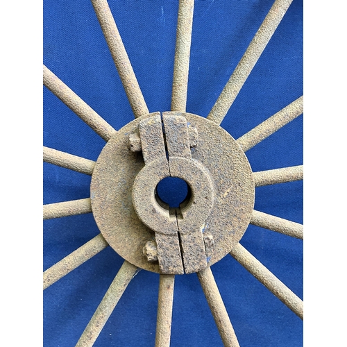 98 - An antique cast iron industrial wheel - approx. 106cm in diameter