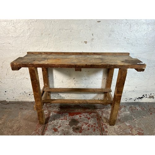 99 - A vintage pine work bench - approx. 87cm high x 137cm wide x 47cm deep