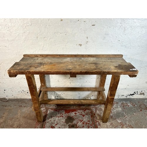 99 - A vintage pine work bench - approx. 87cm high x 137cm wide x 47cm deep